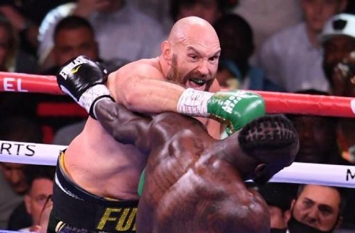 Juara dunia tinju, Tyson Fury saat melawan Wilder. (Robyn Beck / AFP)